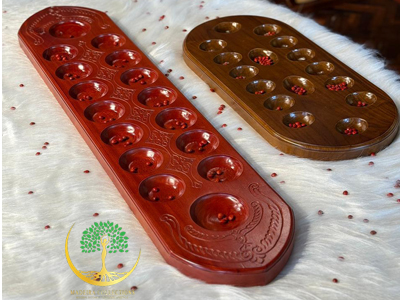 Pallankuzhi Game board
